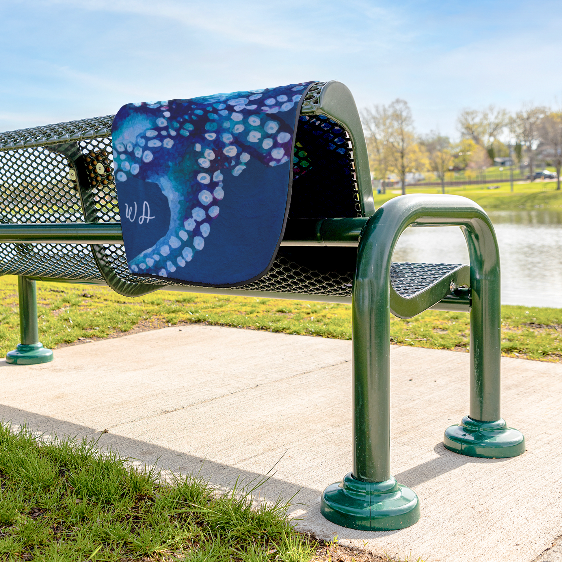 OCTOPUS_DREAM_STADIUM_BLANKET_StadiumBlanket_Lifestyle_Bench_V_AS_Mockup.png