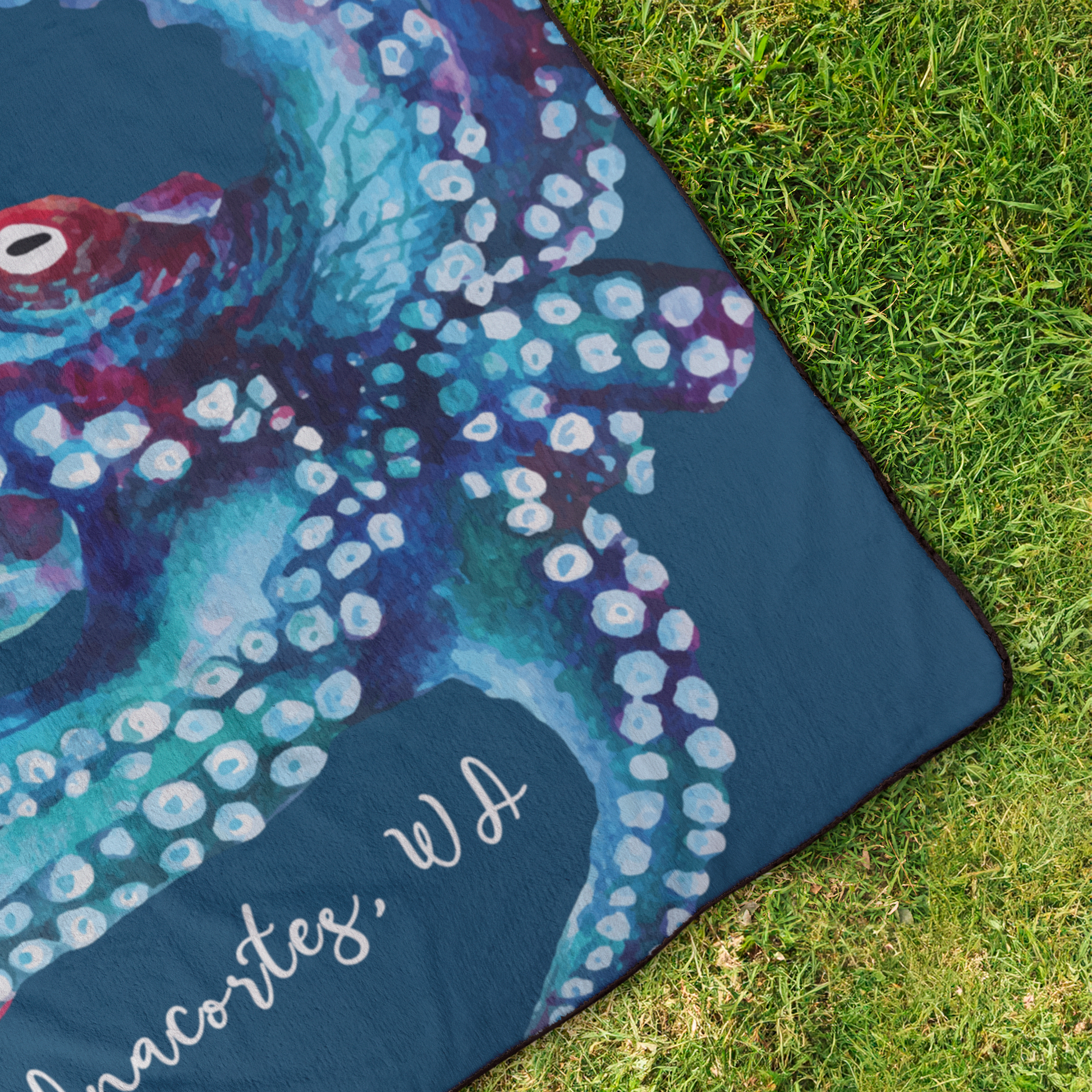 OCTOPUS_DREAM_STADIUM_BLANKET_StadiumBlanket_OverheadGrass_V_Mockup.png